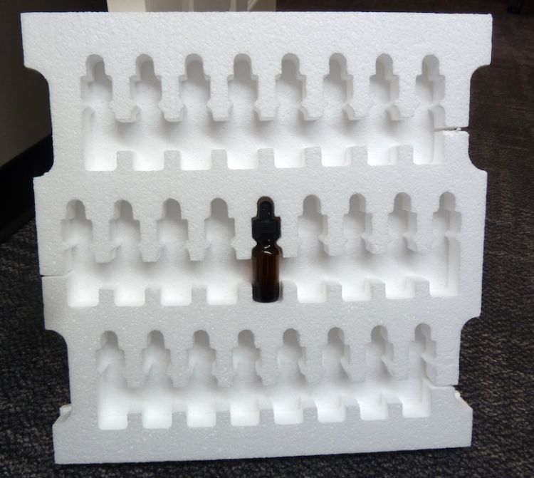 Custom foam box insert for shipping small glass vials like Boston Round bottle with or without topper for pharmaceuticals, CBD oil, cannabis tinctures, essential oils.